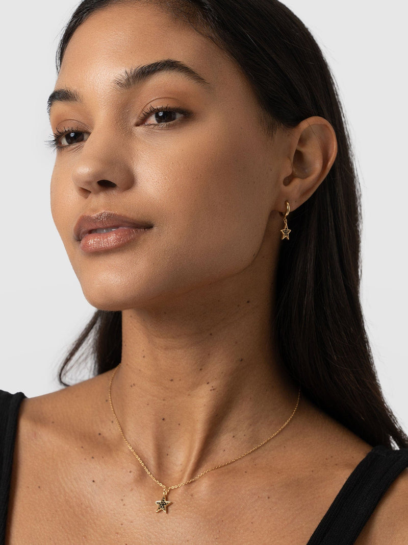 Astral Star Charm Drop Huggie Earrings Gold/Black - Women's Jewellery | Saint + Sofia® EU