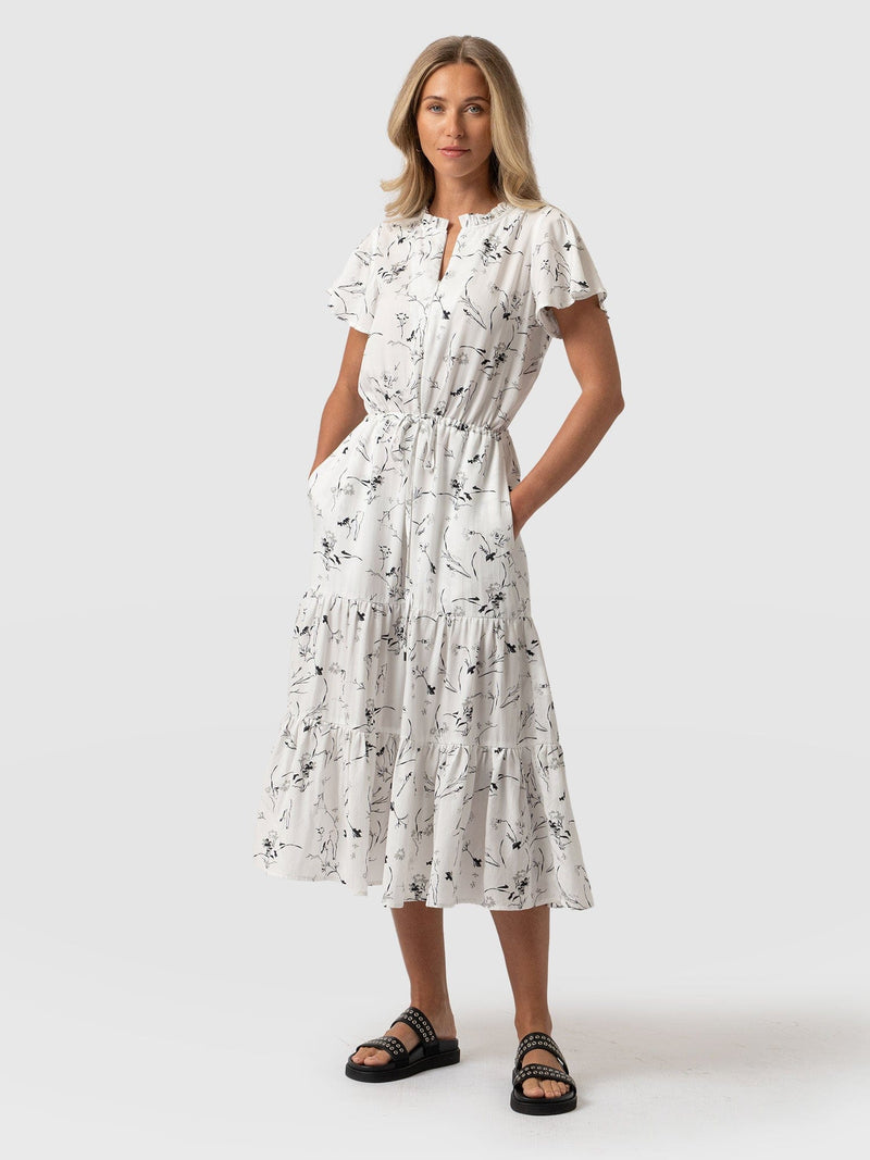 Olivia Flutter Sleeve Dress in White Floral - Women's Dresses | Saint + Sofia® EU