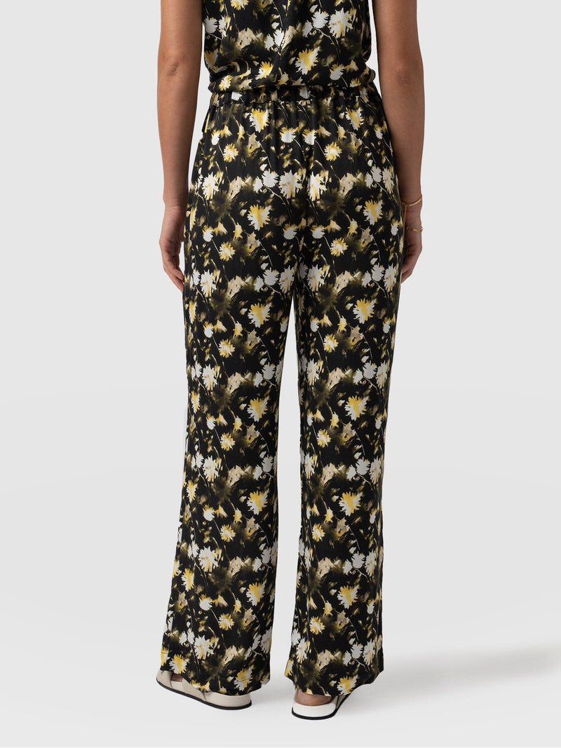 Rowan Wide Leg Pant Black Daisy Floral - Women's Trousers | Saint + Sofia® EU